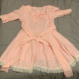 Pink zip up Lolita dress with lace and a tie-able bow
